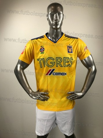 Uniforme Soccer Tigres Local 2018-19: Uniforme de futbol soccer replica modelo Tigres Local 2018-19, incluye playera amarilla, short blanco, y numeros en la espalda.